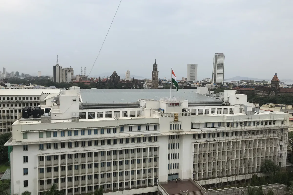 The white multi-storey Mantralaya building in South Mumbai with the national flag on its roof, seen from above